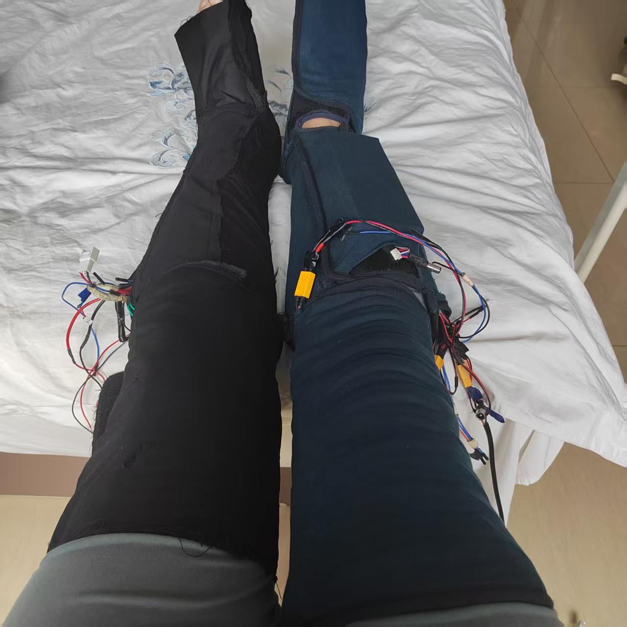 NICNOL nitinol heating massage leg sleeve worn on the leg