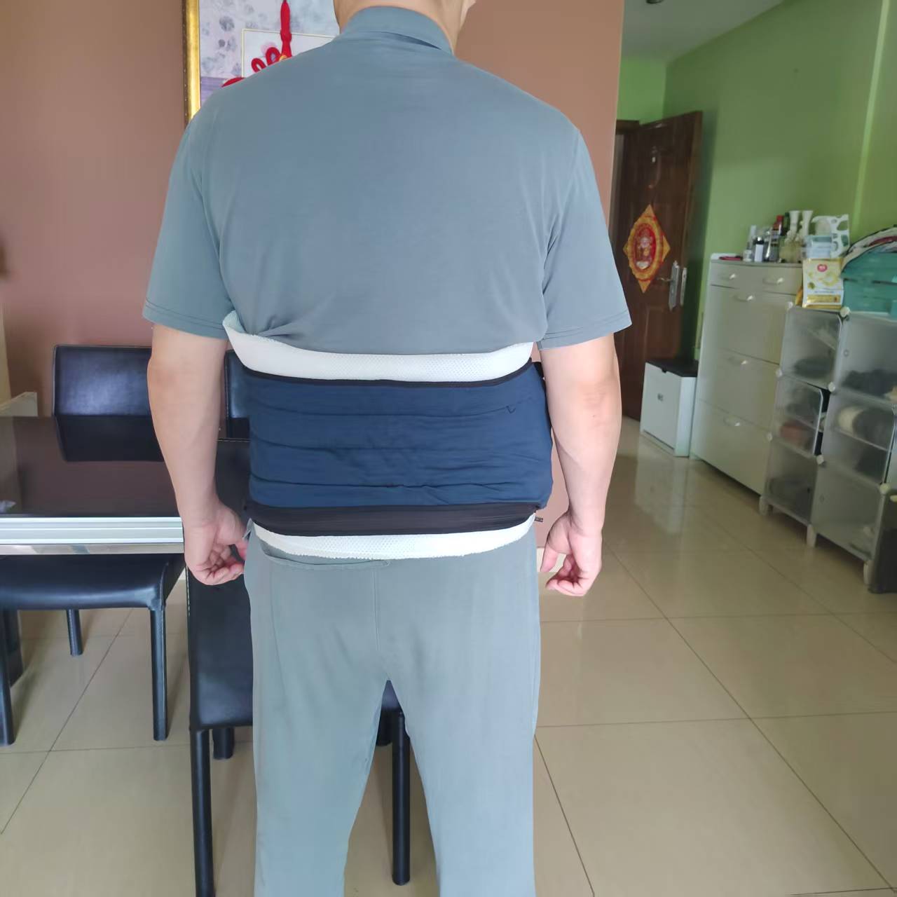 NICNOL nitinol heating massage belt worn on the lower back